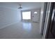 Inviting living room has ceramic tile flooring, textured walls and a window seat at 2918 10Th N St, St Petersburg, FL 33704