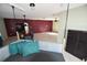 Open-concept living area showcasing a dining space, Gathering room, and indoor hanging swing at 2918 10Th N St, St Petersburg, FL 33704
