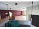 Spacious living room with hanging daybed, dining area, and easy flow to kitchen at 2918 10Th N St, St Petersburg, FL 33704