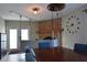 Unique living room design featuring a modern fireplace, exposed brick, and playful swing set, creating an eclectic atmosphere at 2918 10Th N St, St Petersburg, FL 33704