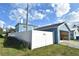 Detached garage with updated siding and a fenced yard at 2918 10Th N St, St Petersburg, FL 33704