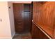 The walk-in closet includes custom wood shelving, drawers, hanging rods, and a jewelry rack at 2918 10Th N St, St Petersburg, FL 33704