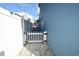 A walkway with white fence and blue house at 2918 10Th N St, St Petersburg, FL 33704