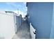 A walkway with white fence and blue house at 2918 10Th N St, St Petersburg, FL 33704