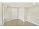 Simple bedroom with wood-look floors and white walls at 3118 Adrian Ave, Largo, FL 33774