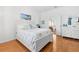 Spacious bedroom with king-size bed and en-suite bathroom at 1028 Orca Ct, Holiday, FL 34691