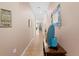 Long hallway with decorative accents at 1028 Orca Ct, Holiday, FL 34691
