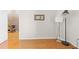 Home office with corner desk, chair and wood floors at 1028 Orca Ct, Holiday, FL 34691