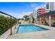 Relaxing hot tub area with surrounding greenery and building view at 1120 E Kennedy Blvd # 1210, Tampa, FL 33602