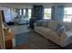 Living room boasts comfy sofas, wood-burning stove, and stylish rug at 164 Colonial Ct # 19, Palm Harbor, FL 34684