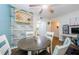 Cozy dining area with wine rack and workspace at 211 S Mcmullen Booth Rd # 189, Clearwater, FL 33759