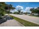 Road view of Tradewinds community, showing building and landscaping at 211 S Mcmullen Booth Rd # 189, Clearwater, FL 33759