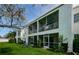 Condo building with screened patio and backyard at 211 S Mcmullen Booth Rd # 189, Clearwater, FL 33759