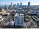 Aerial view of a condominium building with a cityscape view in the background on a sunny day at 226 5Th N Ave # 706, St Petersburg, FL 33701