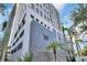 Modern building exterior with a large 'W' logo, sleek design, palm trees, and a contemporary facade at 226 5Th N Ave # 706, St Petersburg, FL 33701