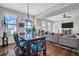 Bright dining area with hardwood floors and a modern chandelier at 226 5Th N Ave # 706, St Petersburg, FL 33701