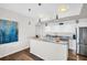 Contemporary kitchen with granite countertops and white cabinetry at 226 5Th N Ave # 706, St Petersburg, FL 33701