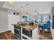 Modern kitchen with granite countertops and stainless steel appliances at 226 5Th N Ave # 706, St Petersburg, FL 33701