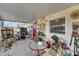 Cozy screened porch with table and chairs, great for relaxing at 3316 16Th Se Ave, Ruskin, FL 33570