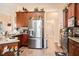 Spacious kitchen with stainless steel refrigerator at 33536 Westwood Dr, Dade City, FL 33523