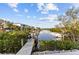 Private dock with walkway leading to the water at 3029 Christophers Watch Ln, Ruskin, FL 33570