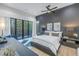 Bedroom with king-size bed and access to a balcony at 1230 Monterey Ne Blvd, St Petersburg, FL 33704