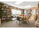 Community library with bookshelves and seating area at 1250 S Pinellas Ave # 1013, Tarpon Springs, FL 34689