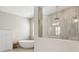 Spa-like bathroom with a freestanding soaking tub and a walk-in shower at 149 Mossy River Ct, Brandon, FL 33511