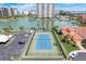 Community tennis court near marina and homes at 1651 Sand Key Estates Ct # 52, Clearwater, FL 33767
