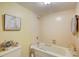 Clean bathroom with tub and shower combination at 1651 Sand Key Estates Ct # 52, Clearwater, FL 33767