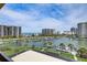 Stunning view of marina, boats, and ocean at 1651 Sand Key Estates Ct # 52, Clearwater, FL 33767
