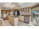 Bright kitchen with granite countertops and island at 1651 Sand Key Estates Ct # 52, Clearwater, FL 33767