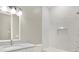 Clean bathroom with white tile, bathtub, and modern vanity at 3845 Seena Manor Ct, Tampa, FL 33618