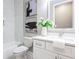 Clean bathroom with a single vanity, shower/tub combo, and white tile at 3845 Seena Manor Ct, Tampa, FL 33618