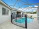 Enjoy this refreshing pool with safety fence at 4249 Balington Dr, Valrico, FL 33596