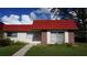 House exterior with red roof and brick accents at 5860 38Th N Ave # 36, St Petersburg, FL 33710