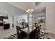 Dining area with hardwood floors and view of kitchen at 6917 Paradiso Dr, Apollo Beach, FL 33572