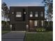 Modern two-story home with dark brick exterior and attached garage at 752 30Th S Ave, St Petersburg, FL 33705