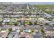 Wide aerial view of canal front community at 8719 Hickorywood Ln, Tampa, FL 33615