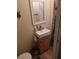 Clean bathroom with a single sink vanity and shower/tub combo at 125 Lake Tarpon Dr # 21, Palm Harbor, FL 34684