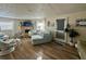 Relaxing living room with comfortable seating and a fireplace at 125 Lake Tarpon Dr # 21, Palm Harbor, FL 34684