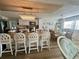 Bright kitchen with an island, granite countertops, and modern appliances at 125 Lake Tarpon Dr # 21, Palm Harbor, FL 34684