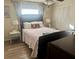 Cozy bedroom with a queen-size bed and ample closet space at 125 Lake Tarpon Dr # 21, Palm Harbor, FL 34684