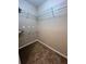 Large walk-in closet with wire shelving at 1910 E Palm Ave # 13102, Tampa, FL 33605
