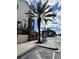 Building exterior with palm tree and street view at 1910 E Palm Ave # 13102, Tampa, FL 33605