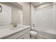 Bathroom with single vanity, bathtub, and tiled shower at 20345 Symphony Pl, Venice, FL 34293