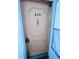 Condo building's front door, numbered 239, with a simple design at 2060 Marilyn St # 239, Clearwater, FL 33765