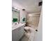 Bathroom with shower stall, toilet, and vanity with double sinks at 2060 Marilyn St # 239, Clearwater, FL 33765