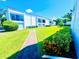 Landscaped grounds with walkways and lush greenery at 2060 Marilyn St # 239, Clearwater, FL 33765