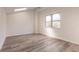 Bright bedroom with wood-look flooring and skylights at 21048 Peachland Blvd, Port Charlotte, FL 33954